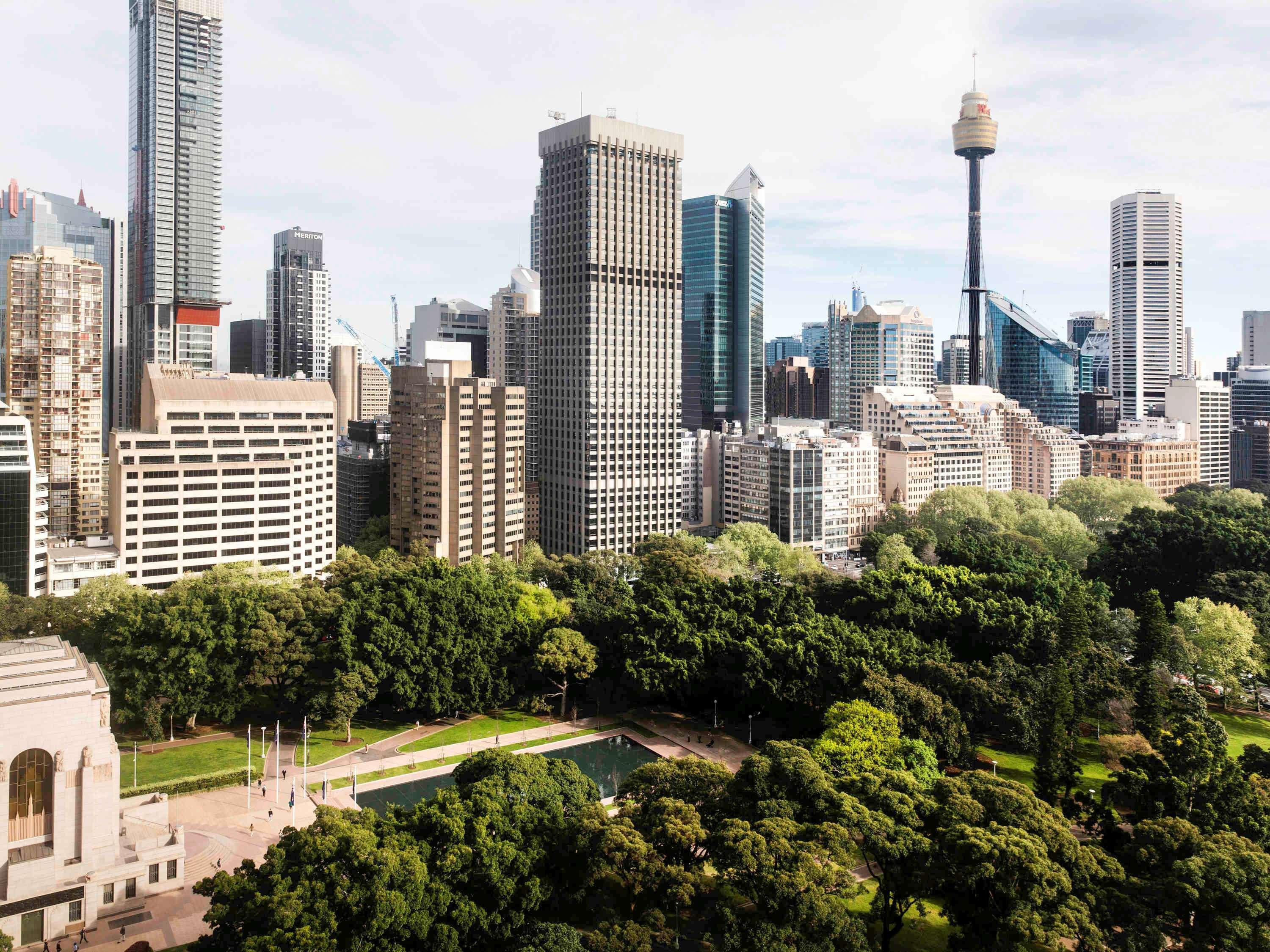 Отель Pullman Sydney Hyde Park Экстерьер фото The proposed new World Trade Centre, with the Sydney CBD in the background
